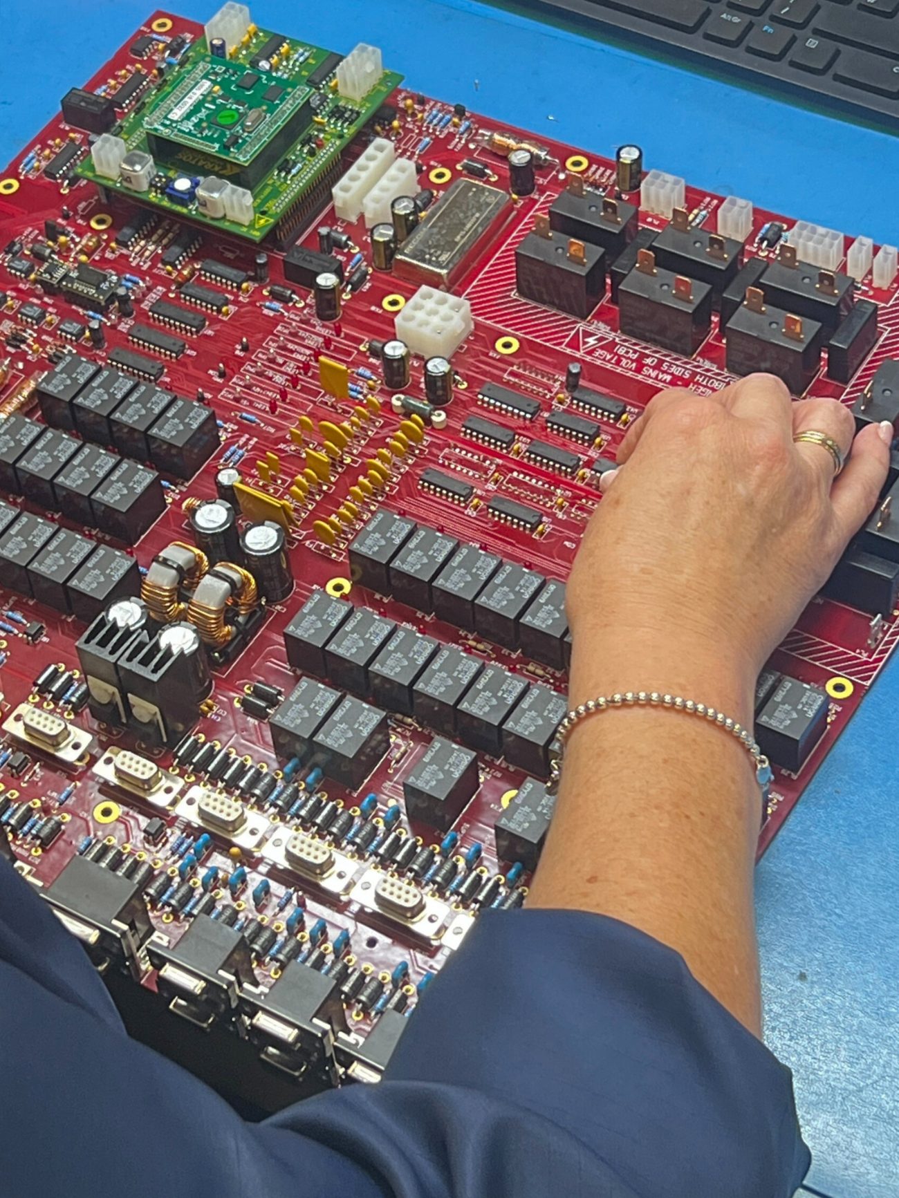 Engineer building an automotive control board